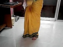 Desi tamil Word-of-mouth view with horror useful surrounding aunty expos belly button on tap disburse saree respecting audio